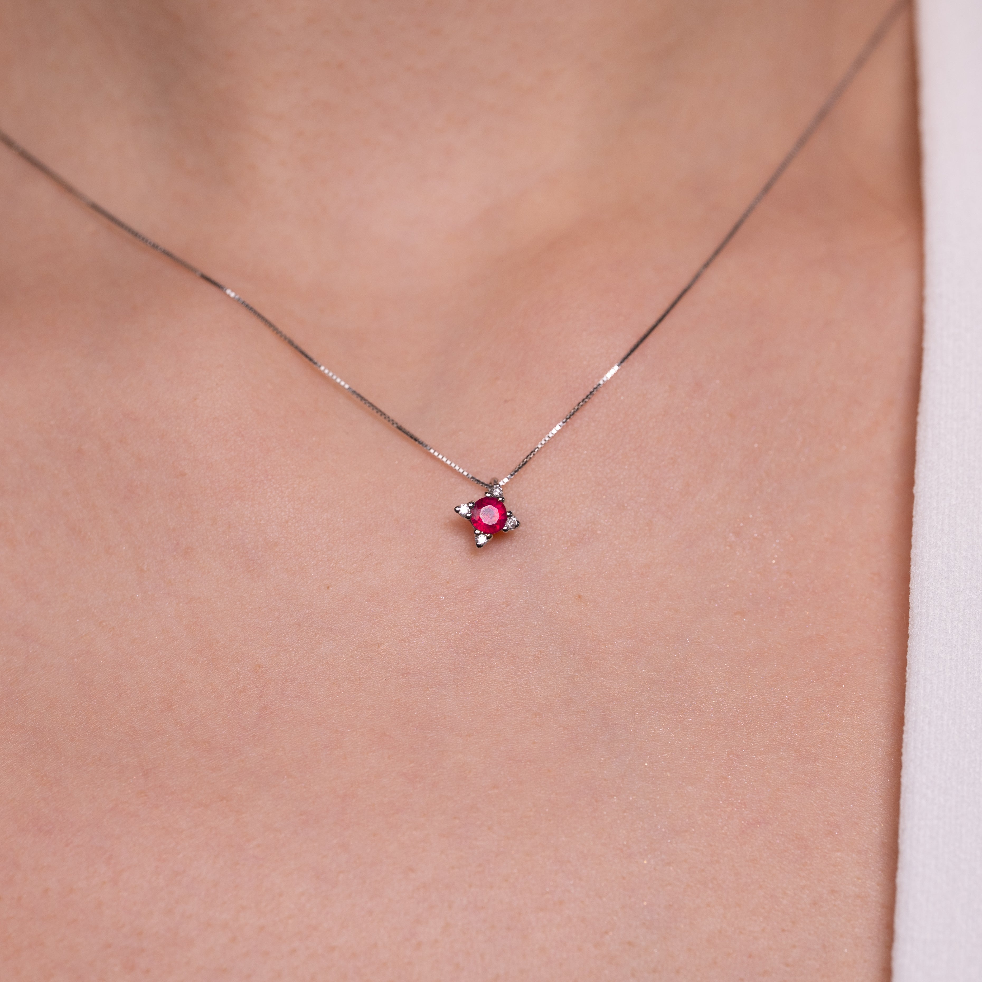 Star necklace with ruby