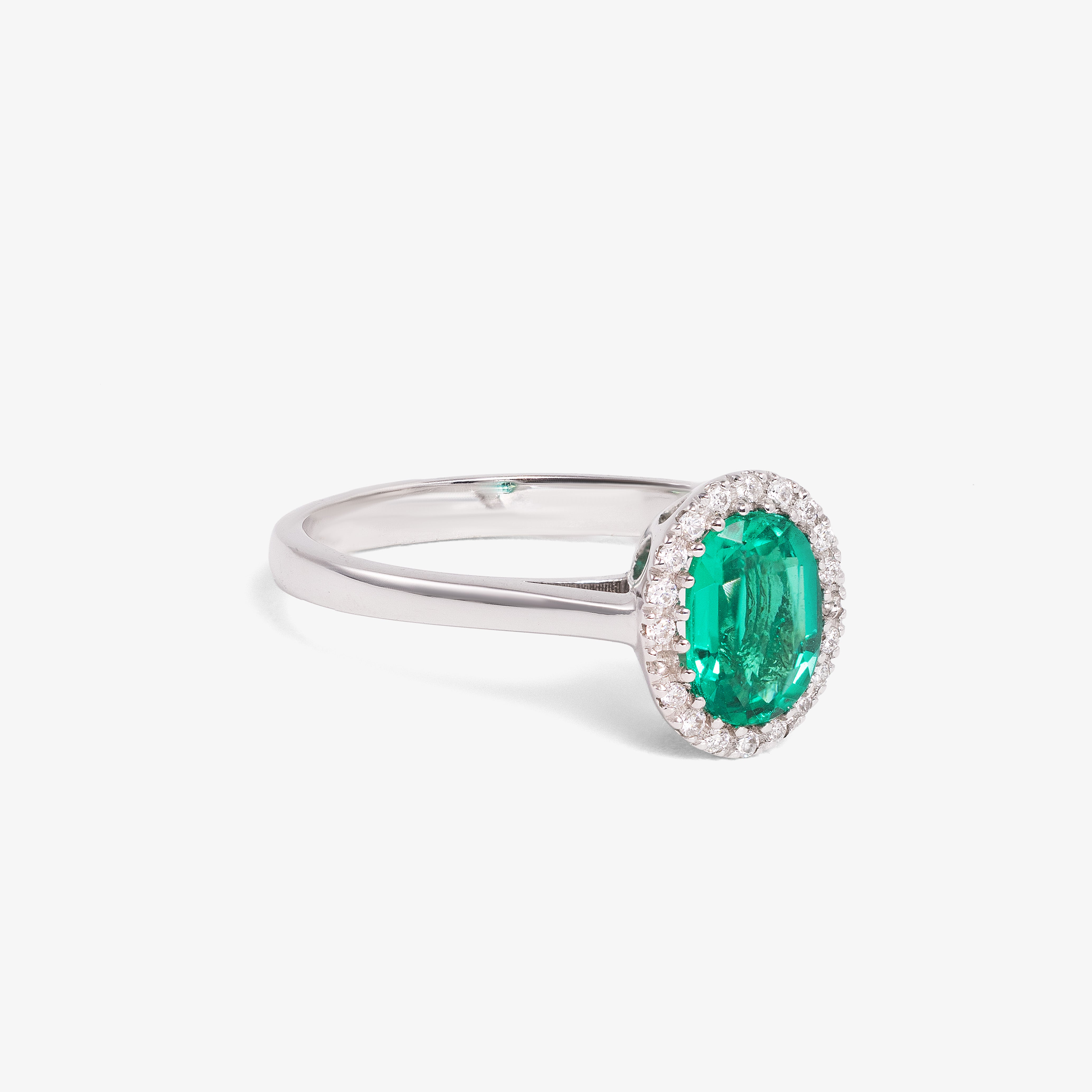 Ring with Emeralds and Diamonds