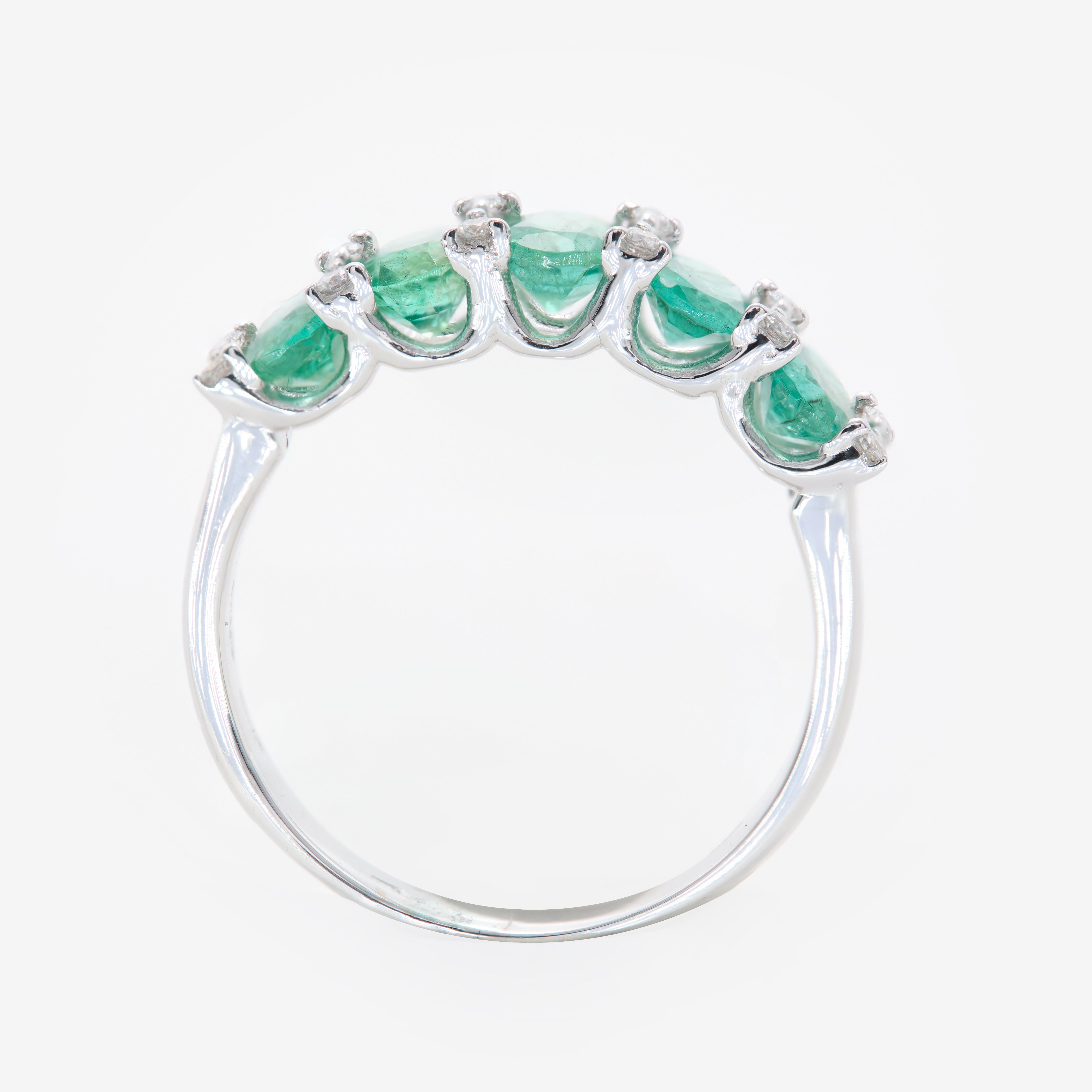 Lane ring with emeralds and diamonds
