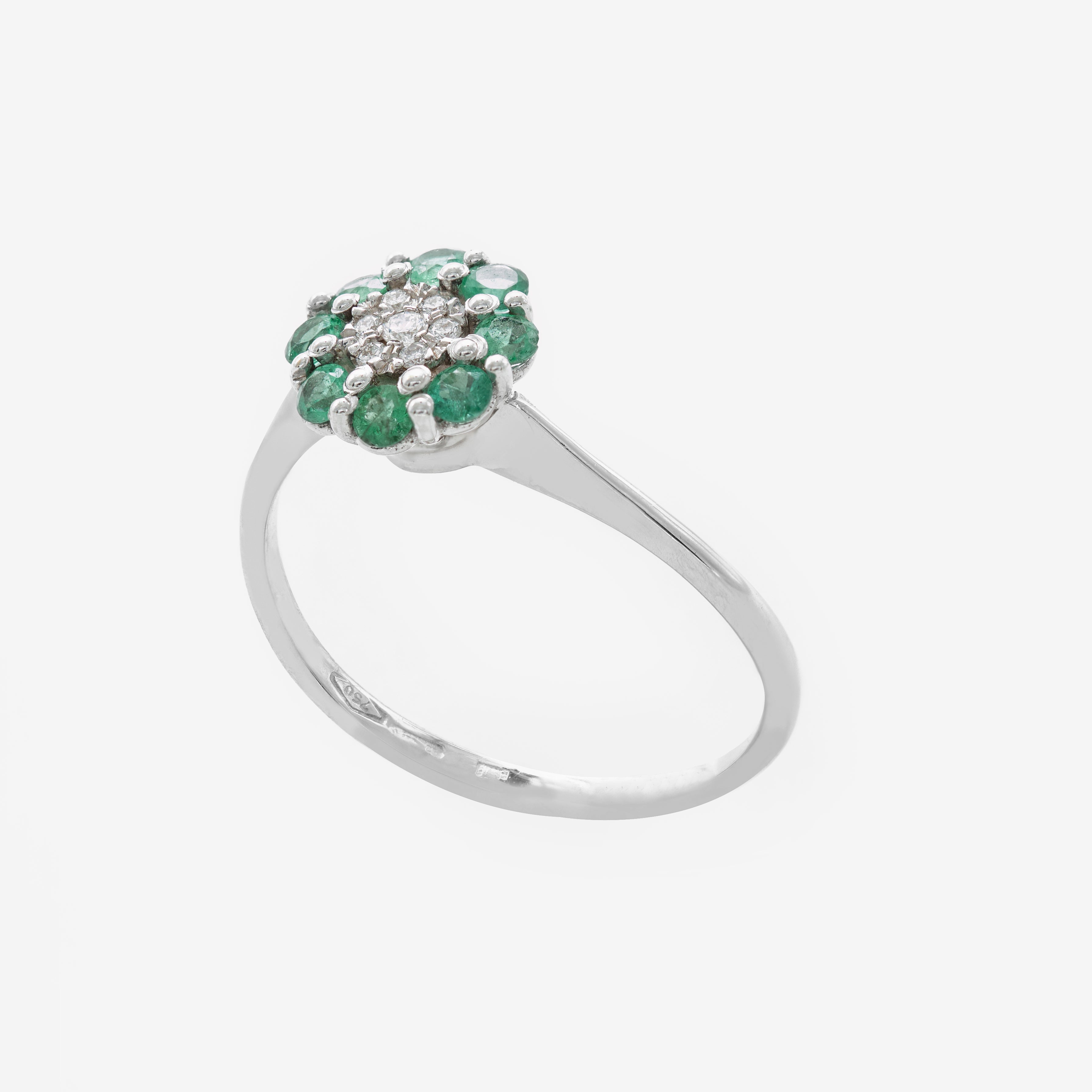 Flower ring with emeralds and diamonds