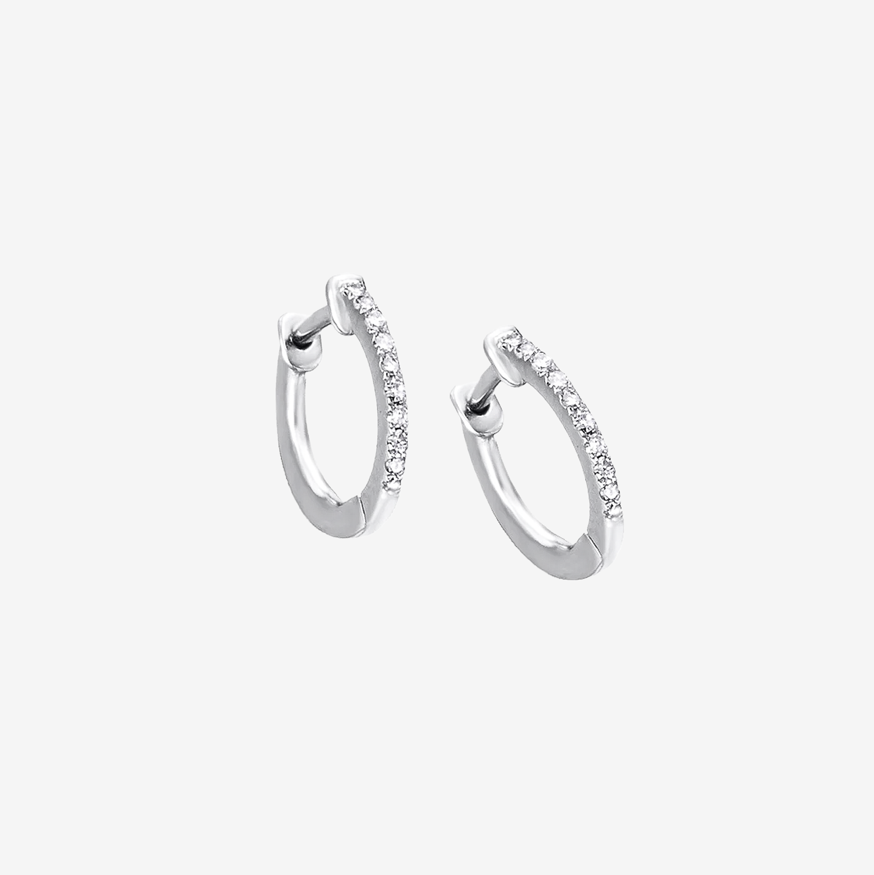 Round earrings with white diamonds 0.06 ct