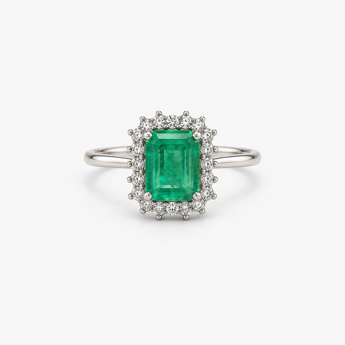 Inel din aur 18K cu smaralde și diamante (1,60 + 0,20 ct)