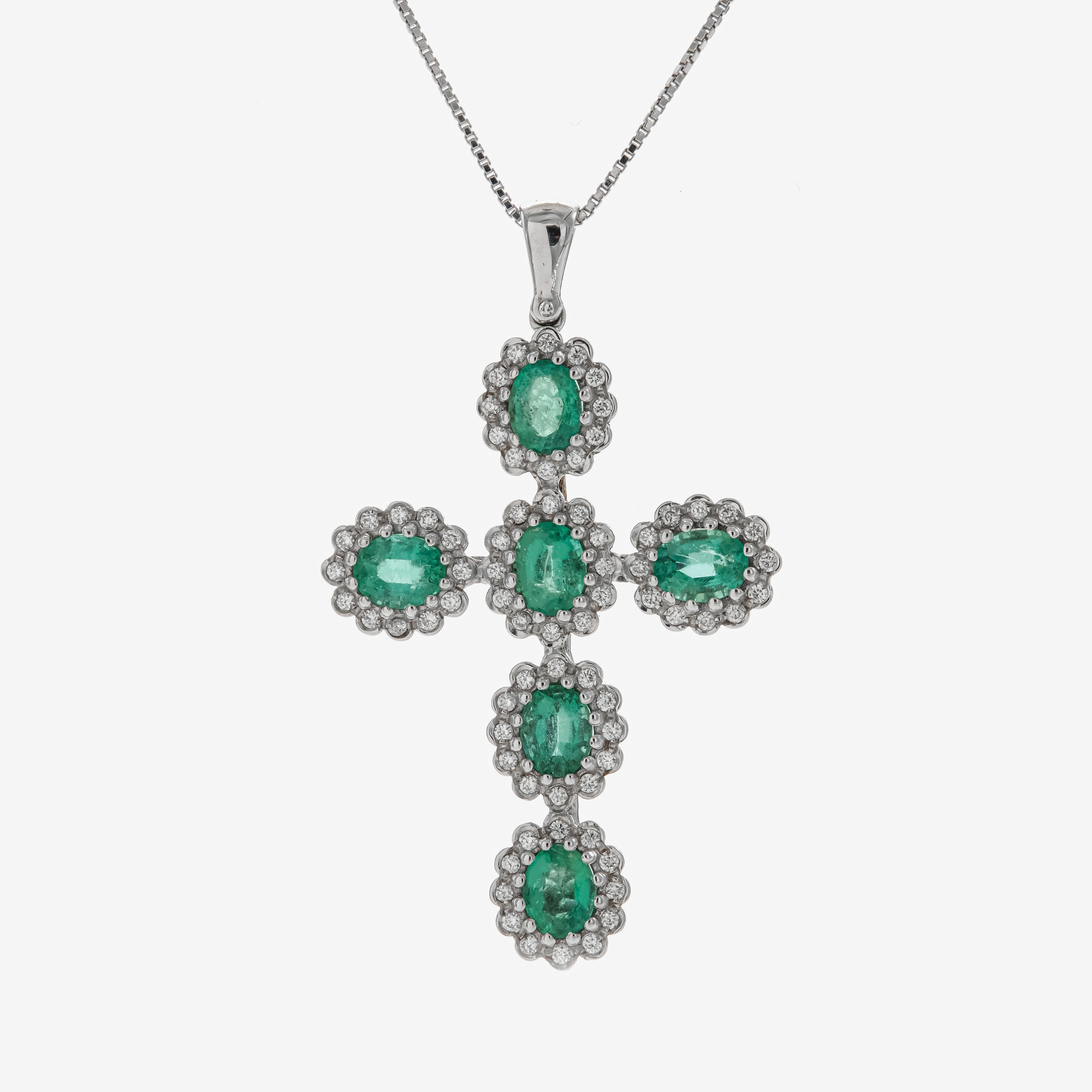 Pendant cross with emeralds
