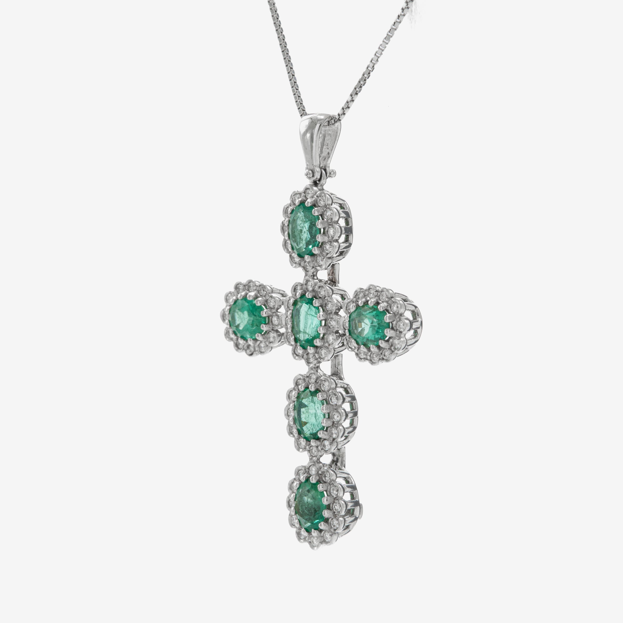Pendant cross with emeralds