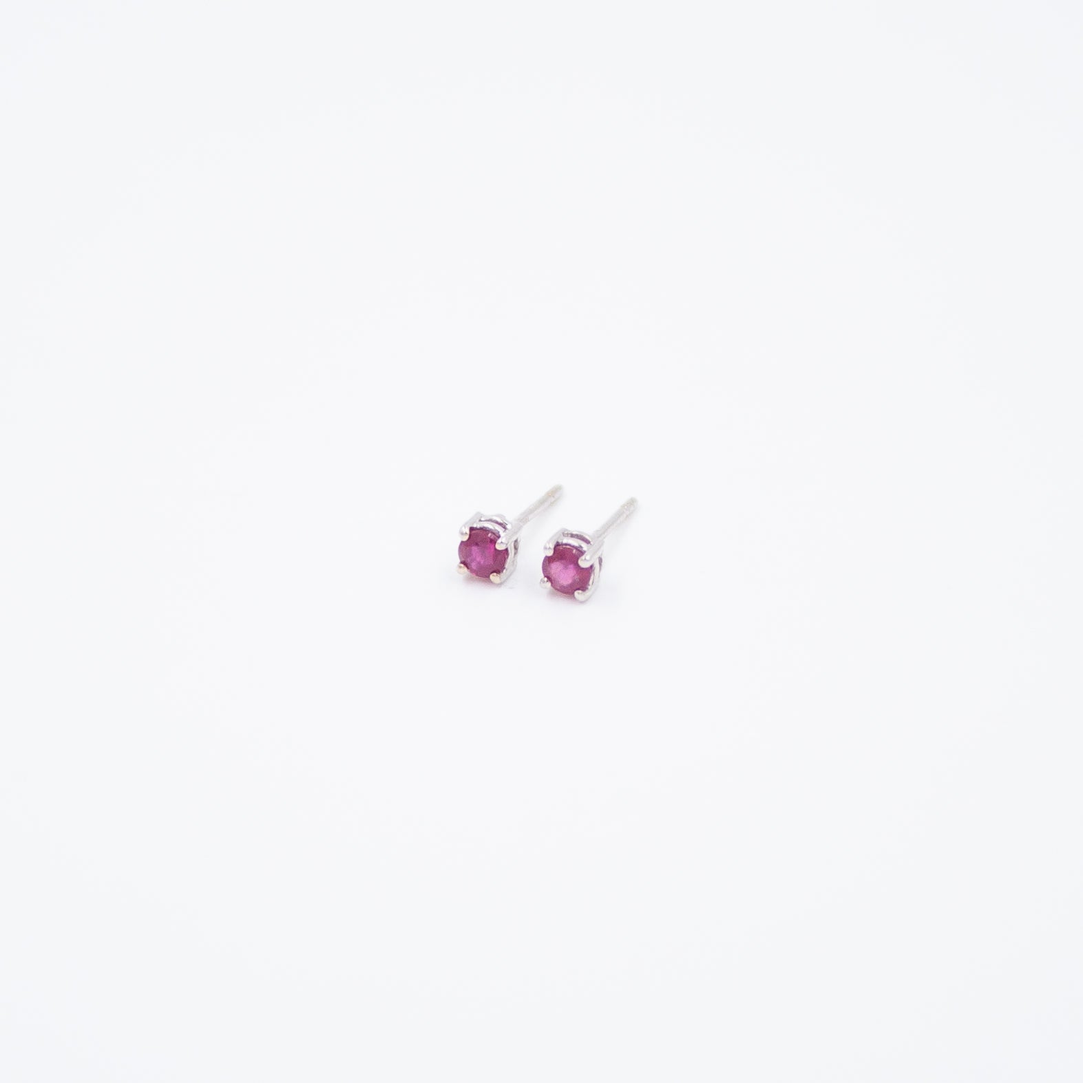 Spotlight earrings with ruby